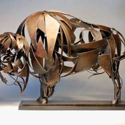 A Bison metal sculpture by Don Rambadt