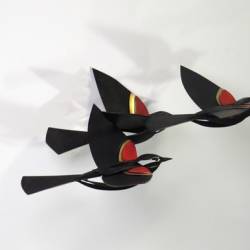 Close up of the Blackbirds in the metal sculpture "The Freshening"